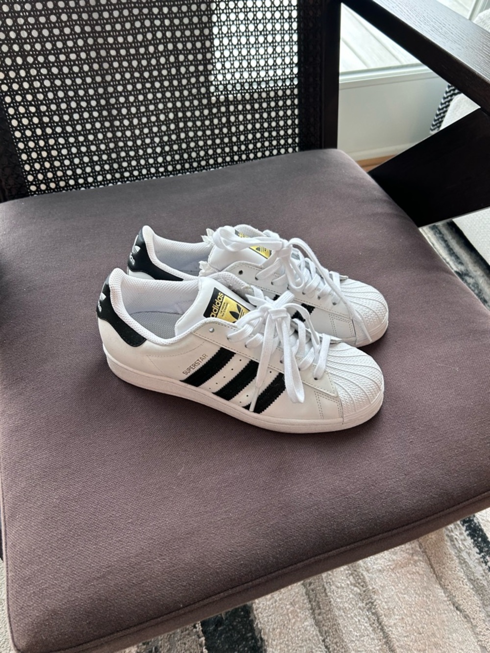 adidas Woman’s White & Black Superstar Sneakers